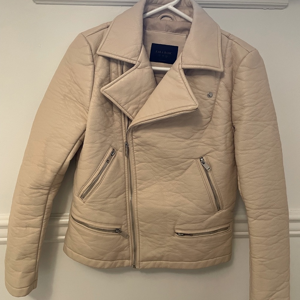 Brand new Zara leather motorcycle jacket. Never worn. Chic and very stylish!